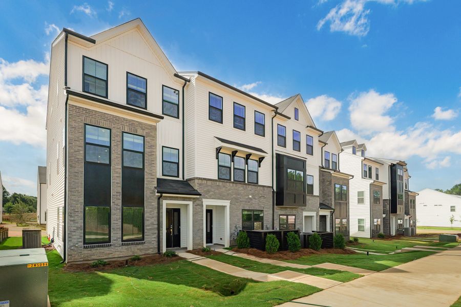 Front exterior of a new home in Nichols Landing, Charlotte, NC, highlighting curb appeal (Image 1). Front exterior of a new home in Nichols Landing, Charlotte, NC, highlighting curb appeal (Image 1).