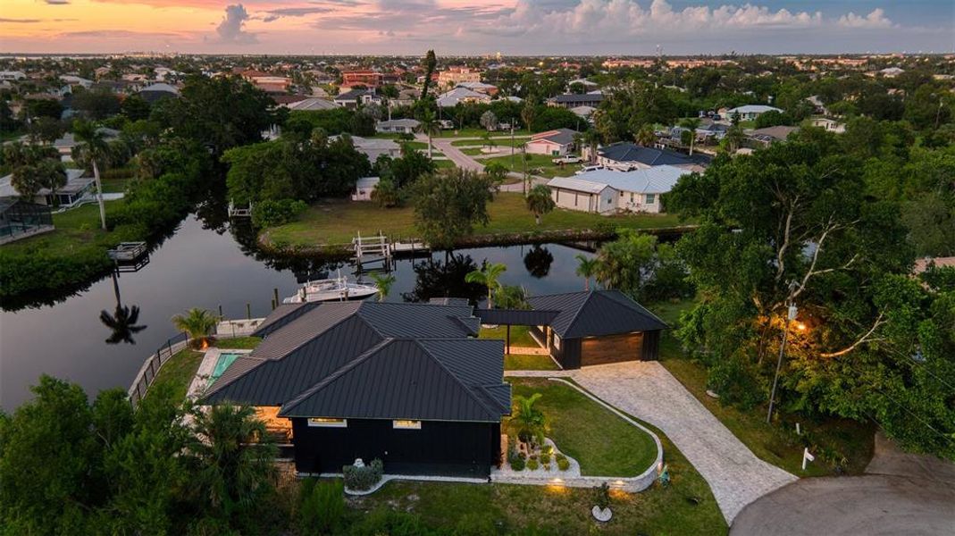 Front exterior of a new home in , Punta Gorda, FL, highlighting curb appeal (Image 21).