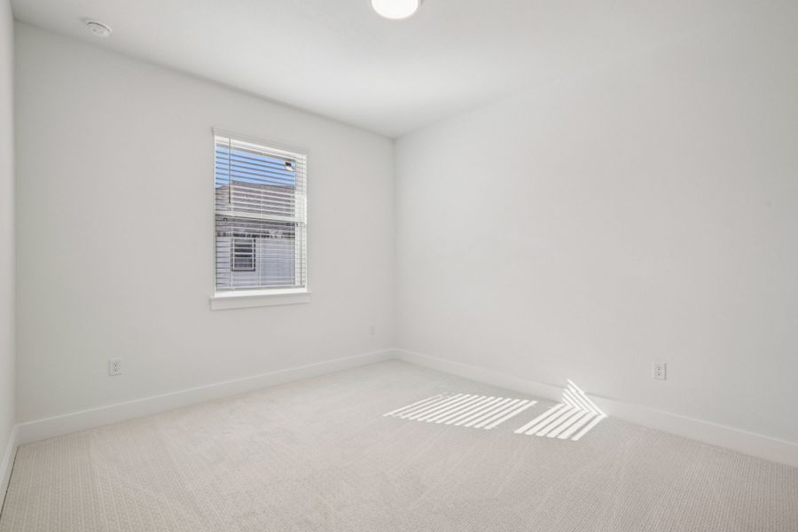 Spacious, unfurnished interior of a new home in Koenig Townhomes, Austin (Image 24).