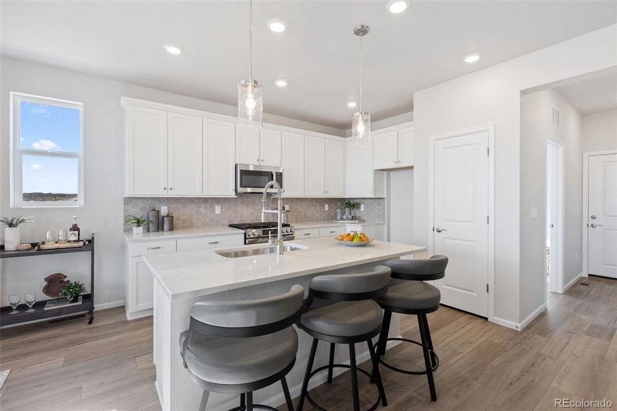 Furnished interior view inside a new home in The Legacy Collection at Talon Pointe, Thornton (Image 13).