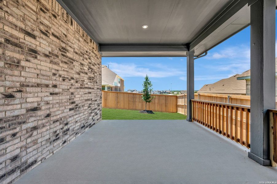 Exterior details and patio area of a home in Mayfair - Select Garden Series, New Braunfels (Image 3). Exterior details and patio area of a home in Mayfair - Select Garden Series, New Braunfels (Image 3).