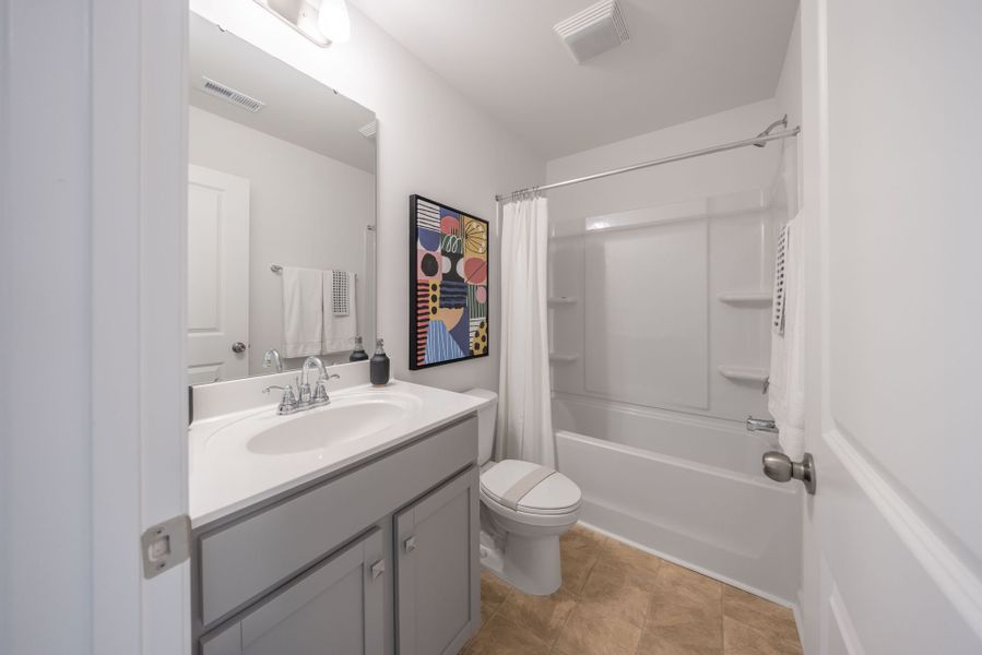 Furnished interior view inside a new home in Dukes Ridge, Charlotte (Image 9).