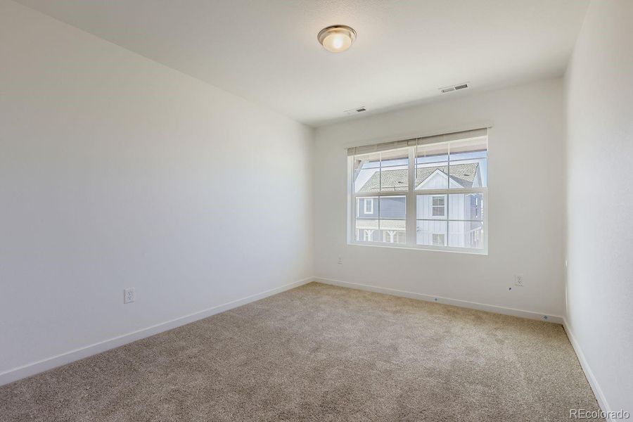 Spacious, unfurnished interior of a new home in Parterre: The Skyline Collection, Thornton (Image 14).