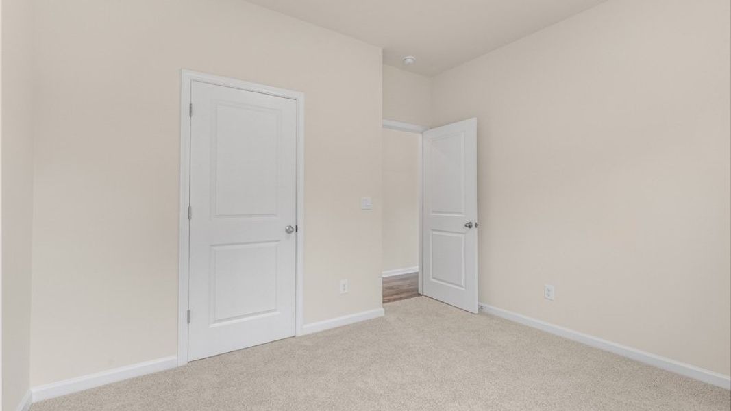 Spacious, unfurnished interior of a new home in Lawson Glen, Clayton (Image 23). Spacious, unfurnished interior of a new home in Lawson Glen, Clayton (Image 23).