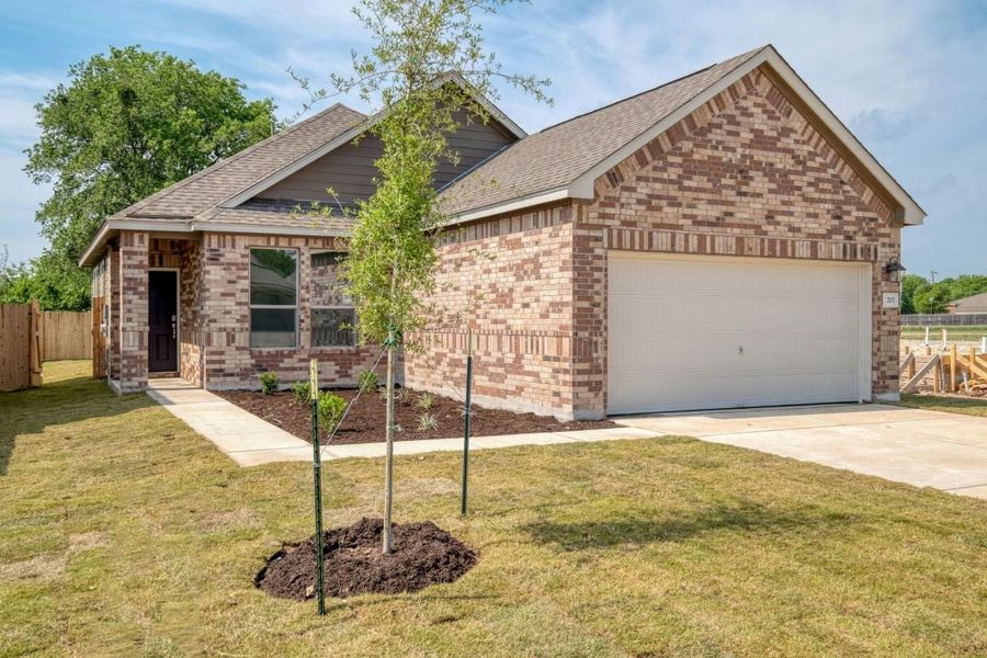 Front exterior of a new home in Hidden Trails, Belton, TX, highlighting curb appeal (Image 1). Front exterior of a new home in Hidden Trails, Belton, TX, highlighting curb appeal (Image 1).