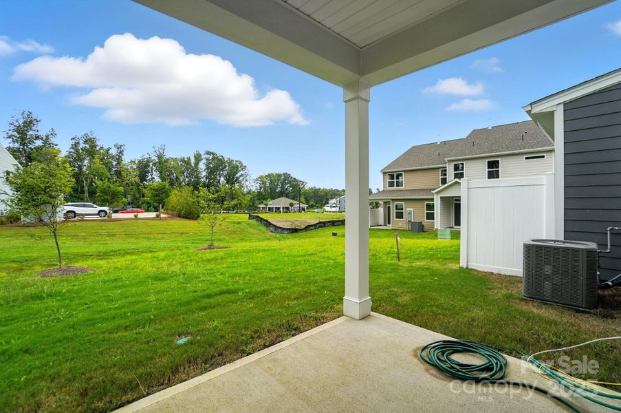 Front exterior of a new home in Harrisburg Village, Harrisburg, NC, highlighting curb appeal (Image 23). Front exterior of a new home in Harrisburg Village, Harrisburg, NC, highlighting curb appeal (Image 23).