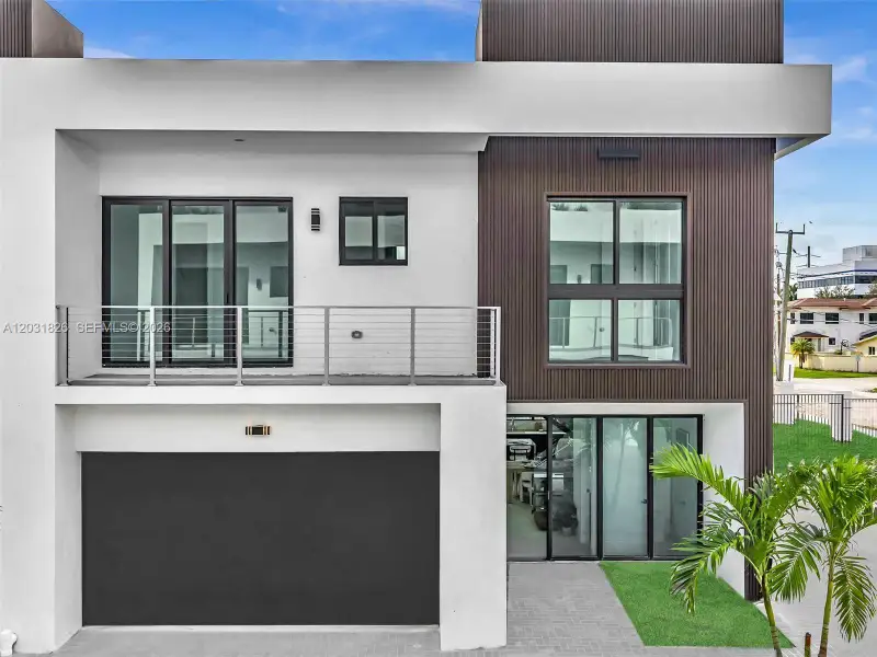 Front exterior of a new home in , Dania Beach, FL, highlighting curb appeal (Image 33).