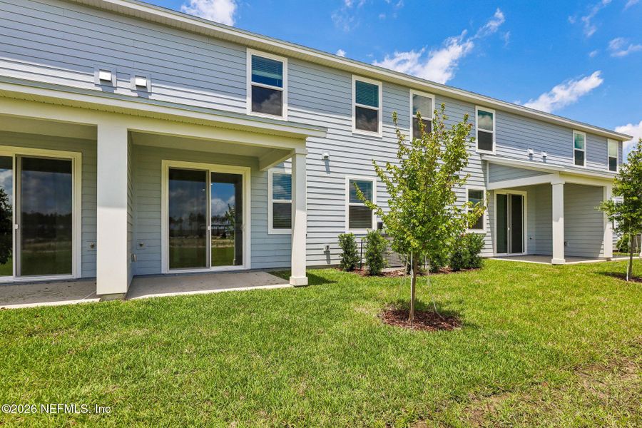 Exterior details and patio area of a home in Parkside at Shearwater, St. Augustine (Image 3).