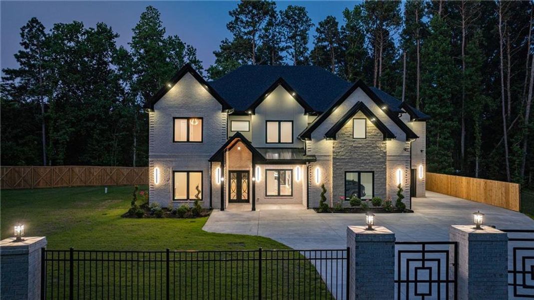 Front exterior of a new home in , Lawrenceville, GA, highlighting curb appeal (Image 36). Front exterior of a new home in , Lawrenceville, GA, highlighting curb appeal (Image 36).