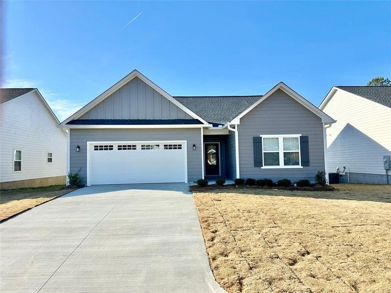 Front exterior of a new home in , Rome, GA, highlighting curb appeal (Image 1). Front exterior of a new home in , Rome, GA, highlighting curb appeal (Image 1).