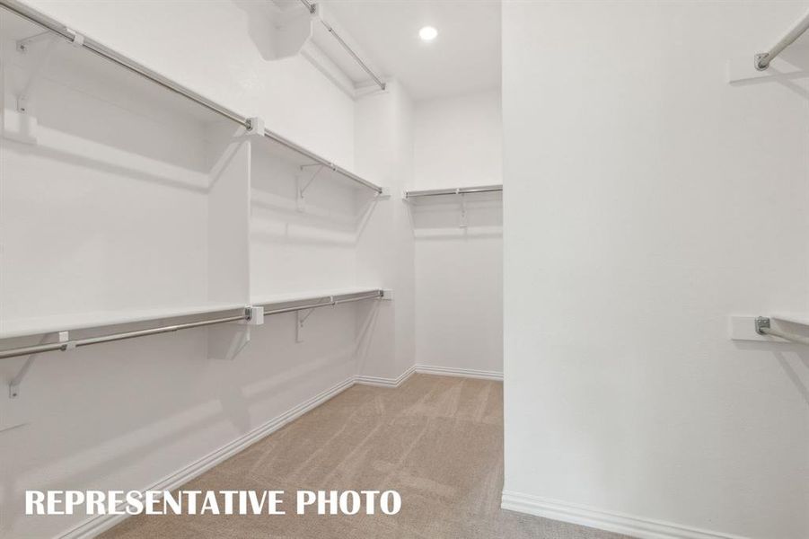 Your new dream closet offers great space and a 3rd row for seasonal hanging space!  REPRESENTATIVE PHOTO