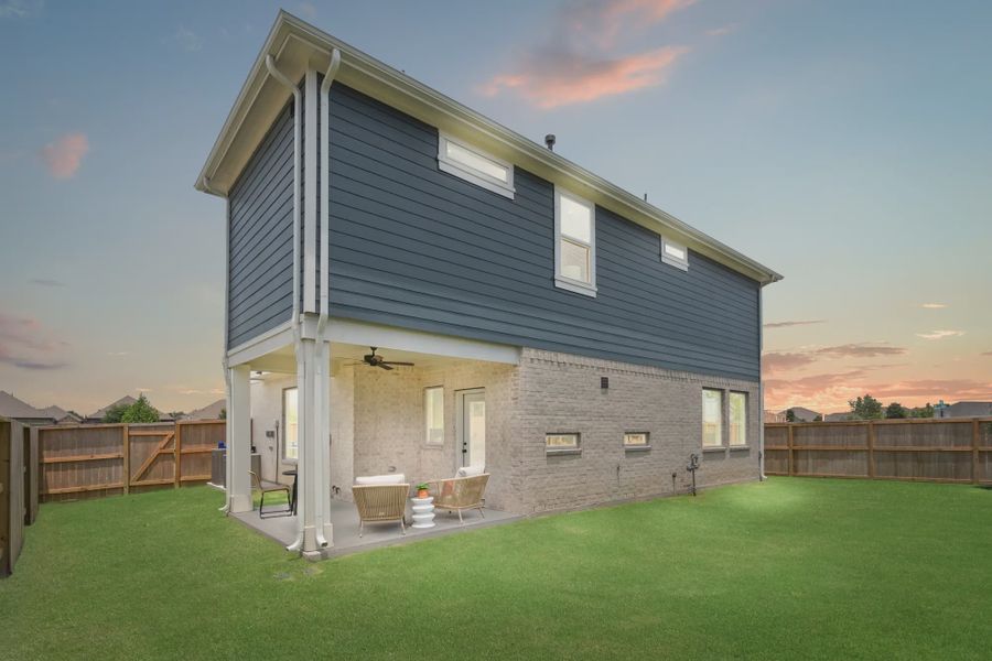 Representative exterior details of a home built from the Dillon by Chesmar Homes in Meridiana Courtyard Collection, Manvel (Image 4).
