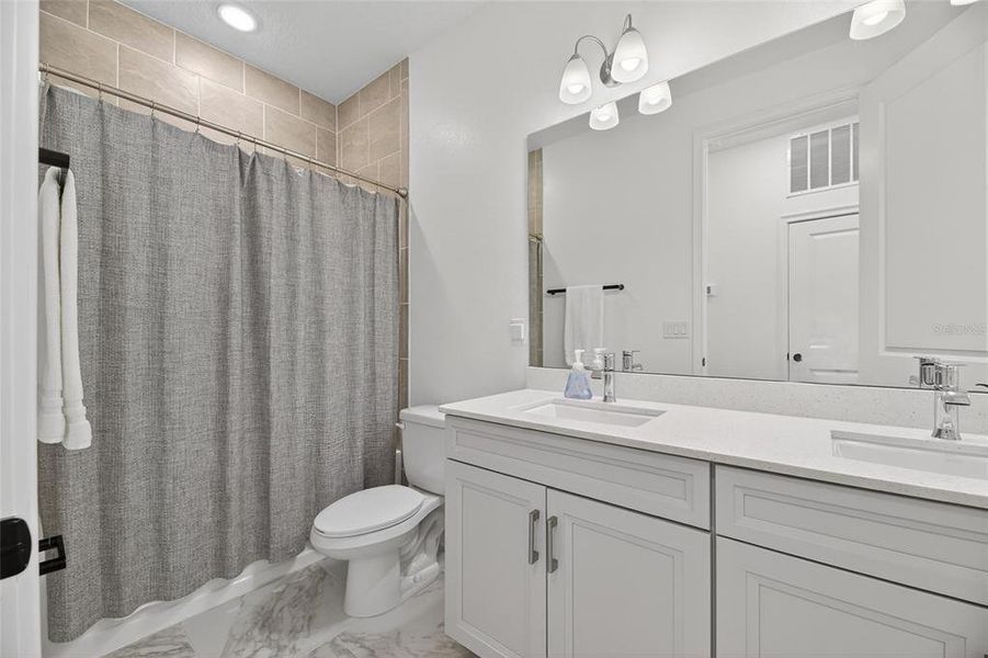 Furnished interior view inside a new home in Marisol Pointe at MiraBay Florida Series, Apollo Beach (Image 17).