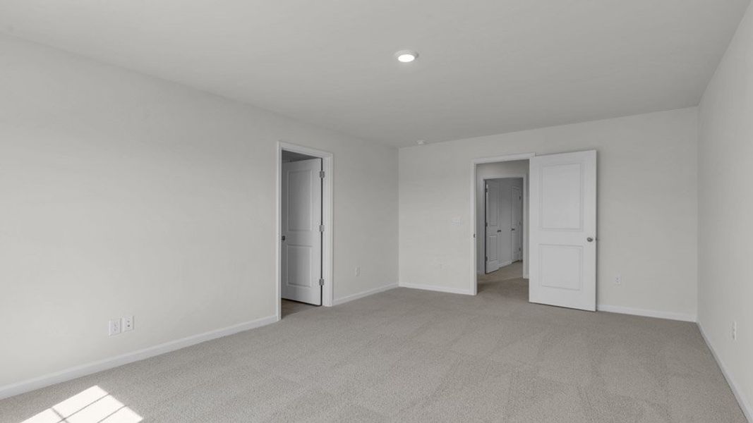 Spacious, unfurnished interior of a new home in The Preserve at Kinsley, Jamestown (Image 28). Spacious, unfurnished interior of a new home in The Preserve at Kinsley, Jamestown (Image 28).