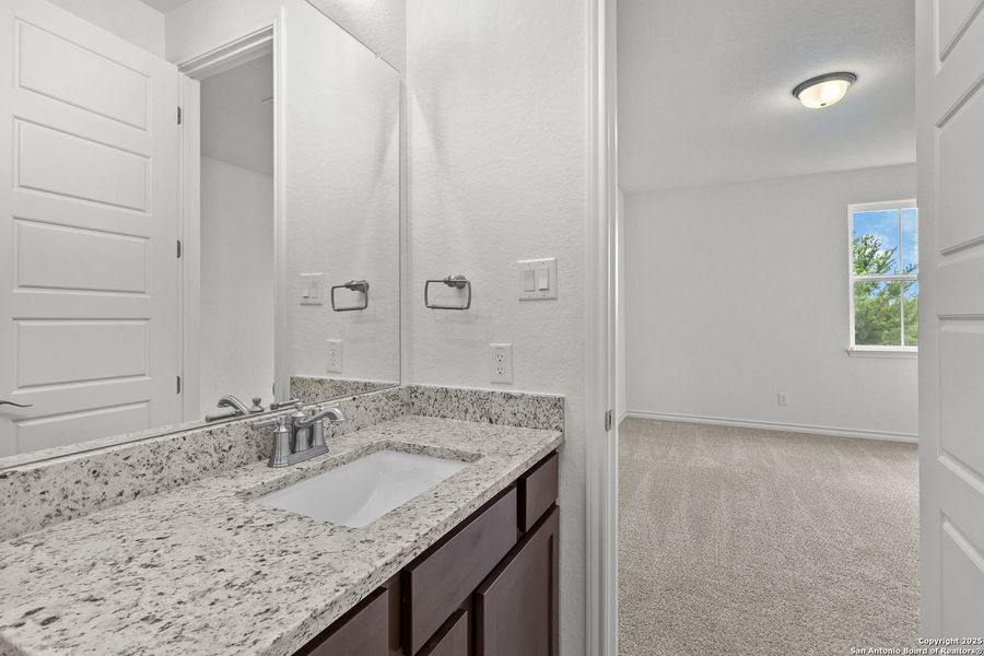 Furnished interior view inside a new home in Ladera, San Antonio (Image 35).