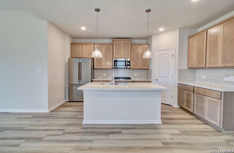 Furnished interior view inside a new home in Stream Waters, Seguin (Image 9).