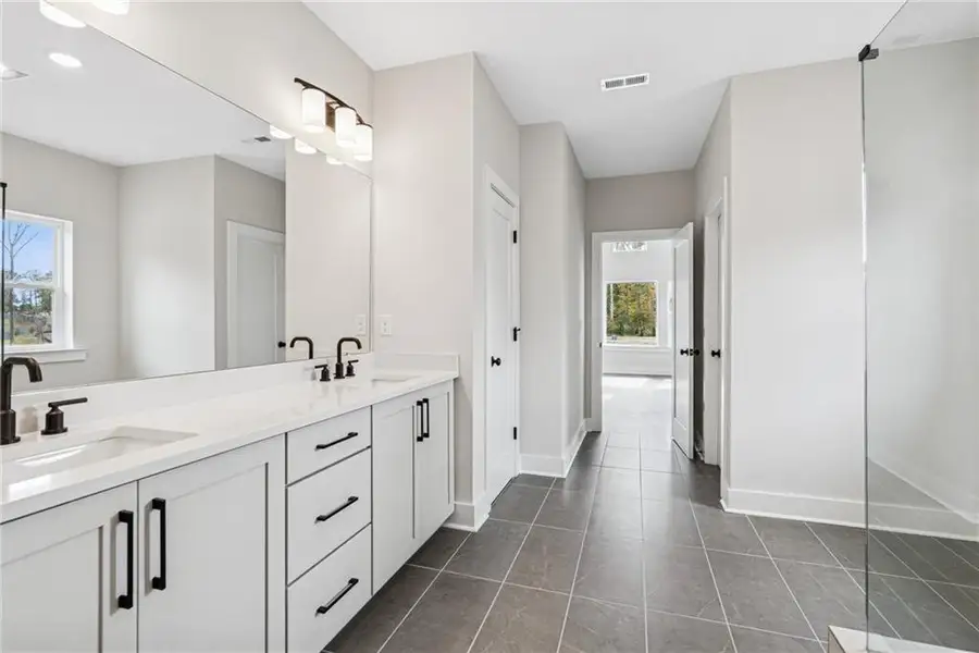 Furnished interior view inside a new home in Settingdown Farms, Cumming (Image 8).