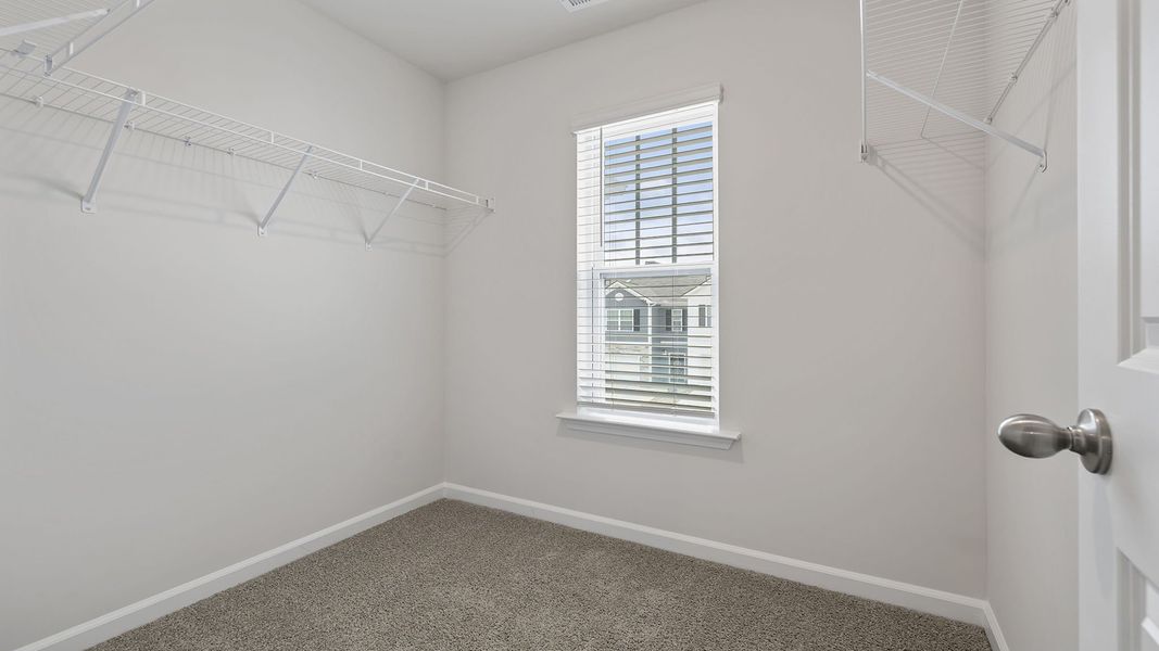 Spacious, unfurnished interior of a new home in Tanglewood Townes, Greenville (Image 29).