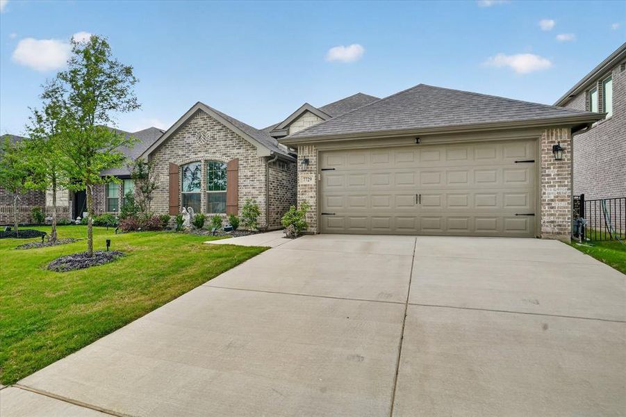 Front exterior of a new home in Silo Mills, Joshua, TX, highlighting curb appeal (Image 25).