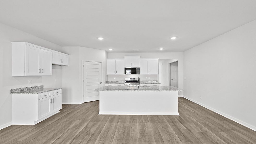Furnished interior view inside a new home in Highland Hills, Graniteville (Image 7).