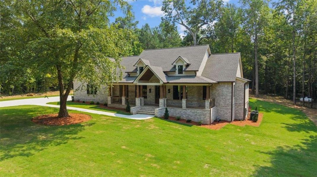 Front exterior of a new home in , Carrollton, GA, highlighting curb appeal (Image 29).