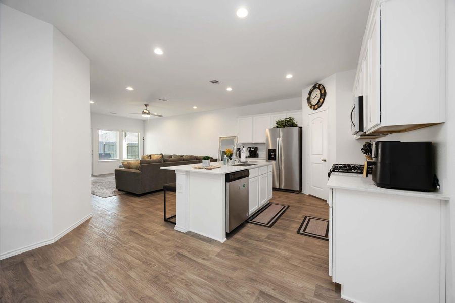 Bright open-concept living area filled wiht natural light Bright open-concept living area filled wiht natural light