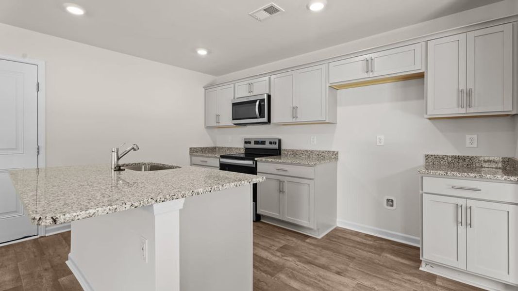 Furnished interior view inside a new home in Jetstream Park, Wilson (Image 8).