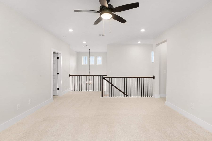 Representative unfurnished interior of a home built from the Cornell – 60′ Lot by Chesmar Homes in Lakes of Cane Island, Katy (Image 17).