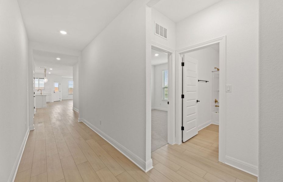 Representative unfurnished interior of a home built from the Orchard by Pulte Homes in Saddleback at Santa Rita Ranch, Liberty Hill (Image 18).