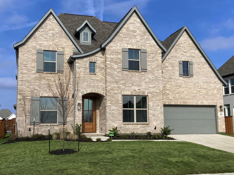 Representative exterior photo of a completed home built from the Ames - SH 5254 by Shaddock Homes in Grand Oaks at Green Meadows - 60', Celina, TX (Image 22). Representative exterior photo of a completed home built from the Ames - SH 5254 by Shaddock Homes in Grand Oaks at Green Meadows - 60', Celina, TX (Image 22).