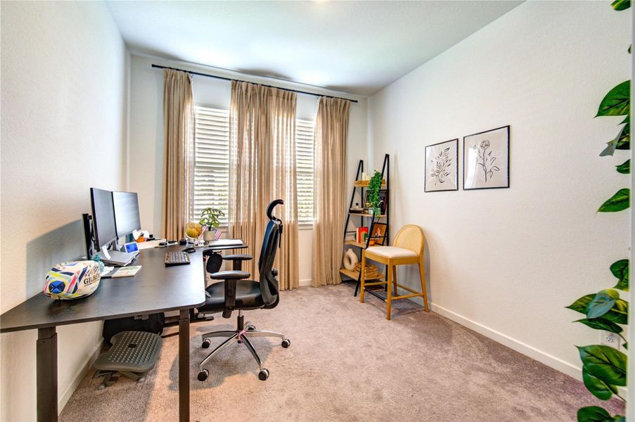 Third Bedroom offers a generous layout with pleasant views of the front yard, enhanced by large window panels that invite in abundant natural light. High ceilings add to the sense of openness, while its versatile design allows the space to function beautifully as a bedroom, home office, or creative workspace—tailored to suit your lifestyle needs.