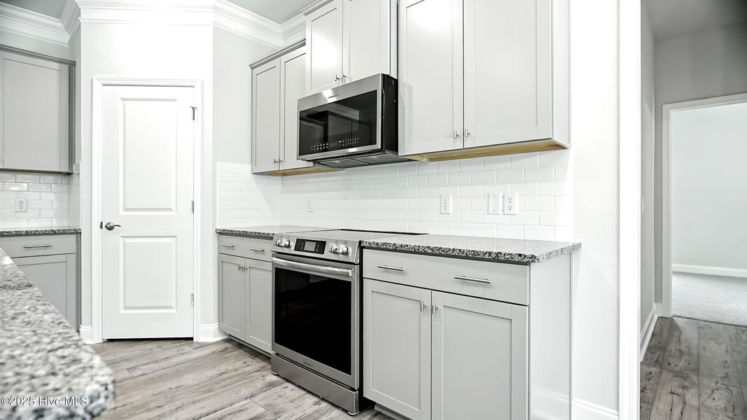 Furnished interior view inside a new home in Palmetto Creek, Bolivia (Image 6).