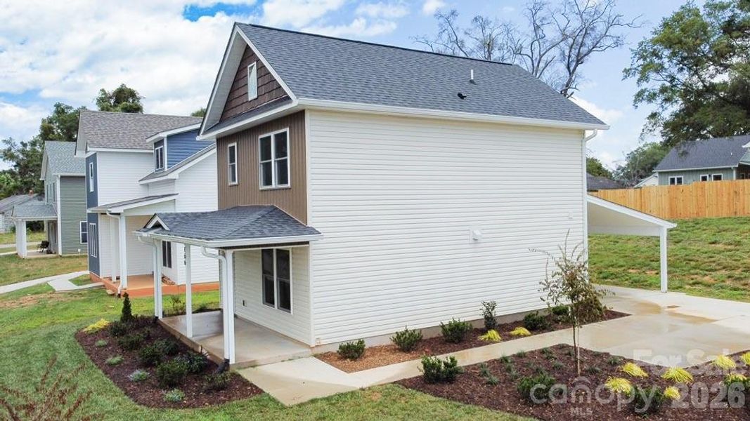 Exterior details and patio area of a home in , Spindale (Image 3).