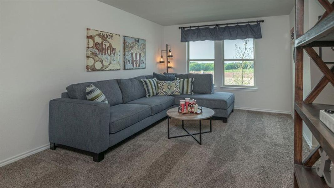 Carpeted interior space with neutral wall tones