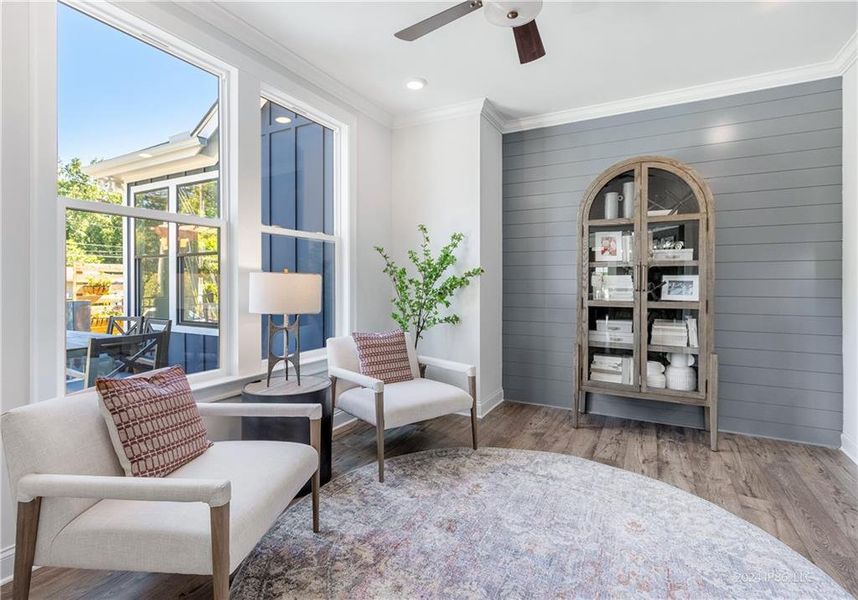 Furnished interior in a model home at The Courtyards by The Manor in Alpharetta (Image 4).