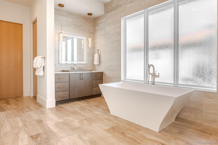 A broad opaque window invites daylight to fill the bath in a calm, luminous wash.