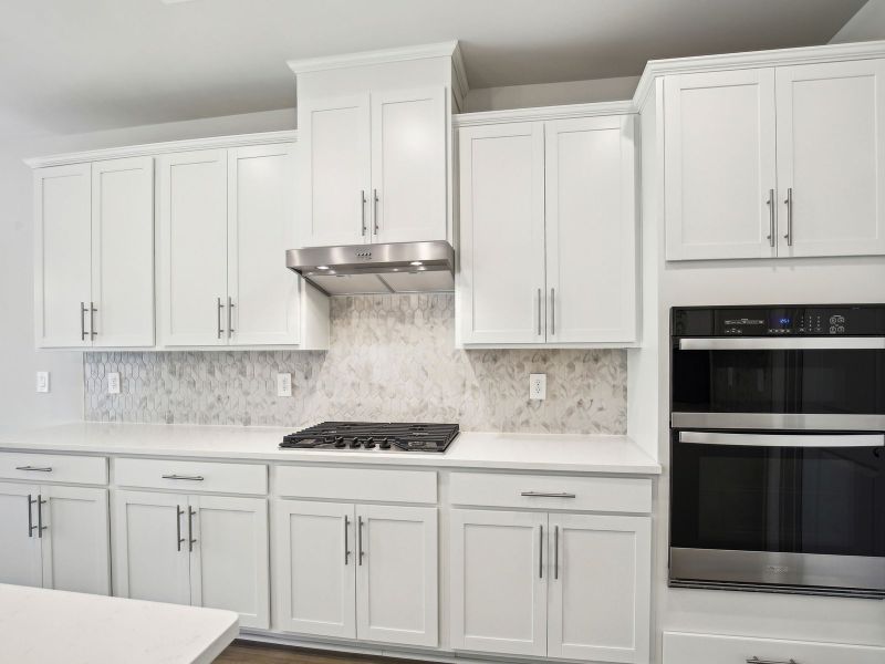 Kitchen in the Sherwood floorplan in a Meritage Homes community. Kitchen in the Sherwood floorplan in a Meritage Homes community.