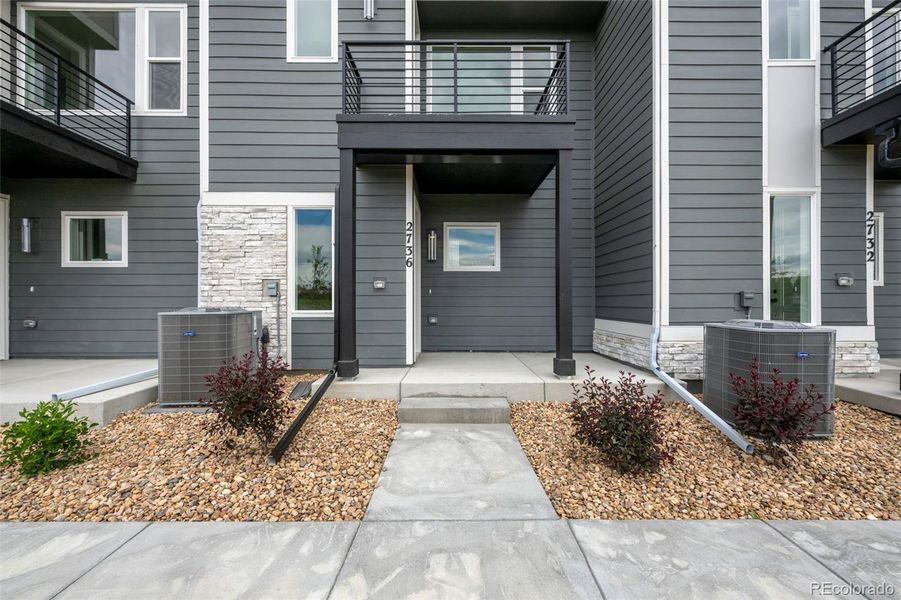 Front exterior of a new home in , Denver, CO, highlighting curb appeal (Image 2).