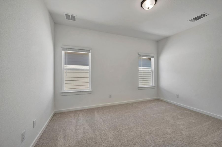 Spacious, unfurnished interior of a new home in Heritage, Dripping Springs (Image 27).
