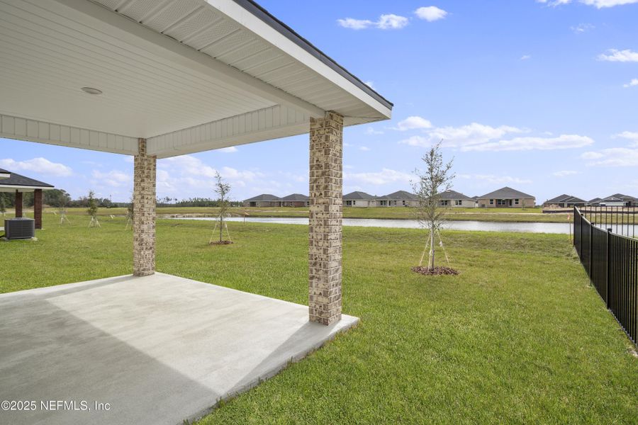 Exterior details and patio area of a home in Shadow Crest at Rolling Hills, Green Cove Springs (Image 4). Exterior details and patio area of a home in Shadow Crest at Rolling Hills, Green Cove Springs (Image 4).
