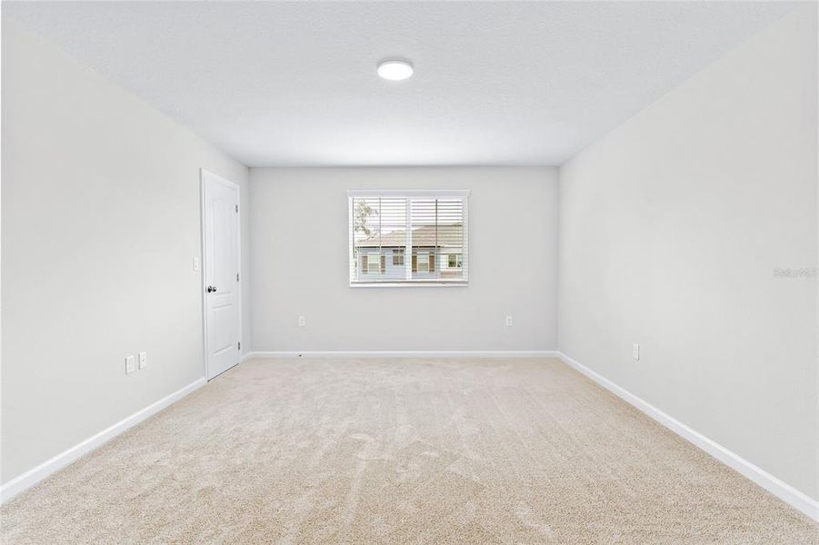 Spacious, unfurnished interior of a new home in Towns at Tuskawilla Commons, Oviedo (Image 16).