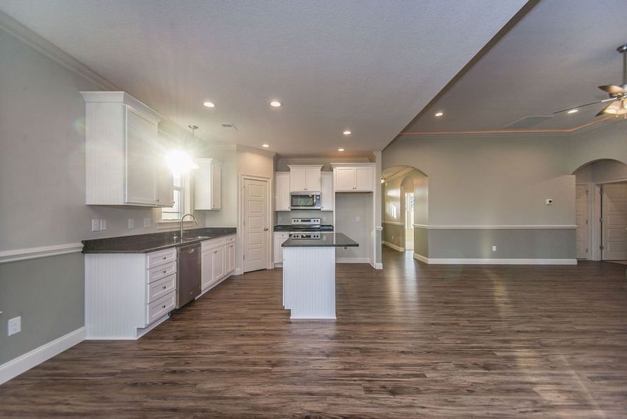 Representative furnished interior of a home built from the Mediterranean by Enchanted Homes in Lonesome Dove, San Antonio (Image 14).