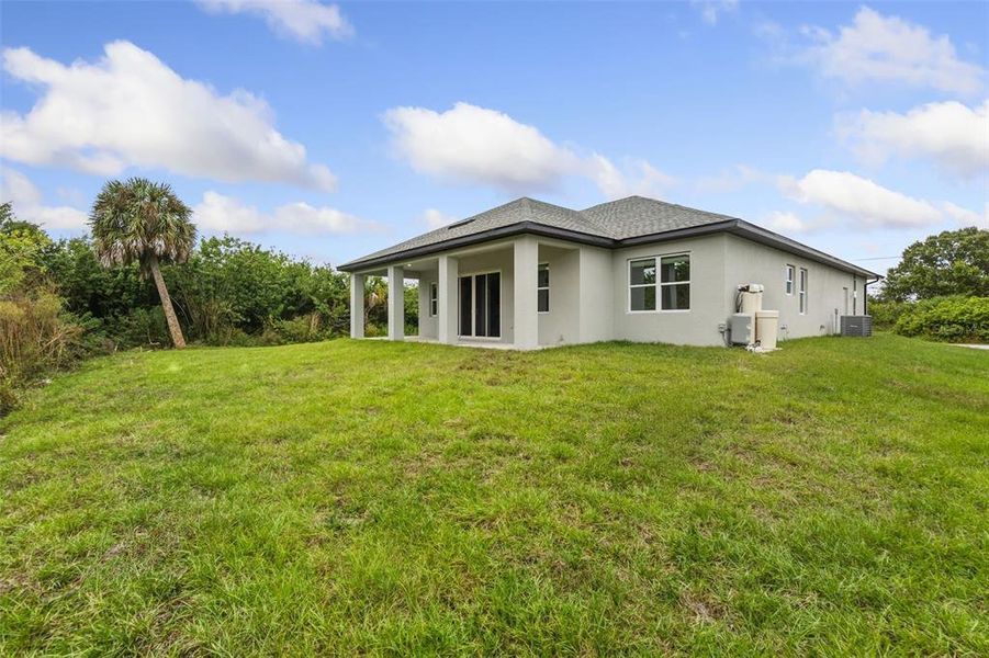 Exterior details and patio area of a home in , Port Charlotte (Image 3).