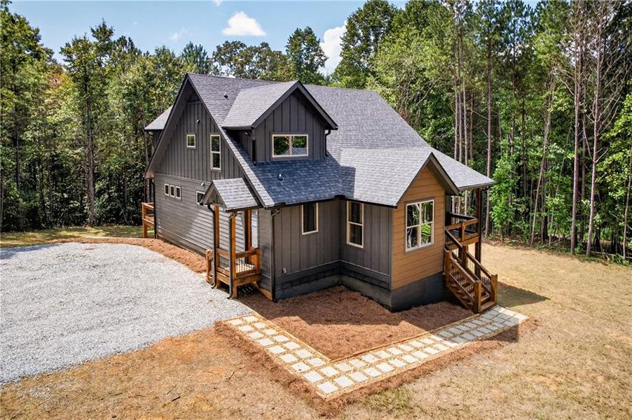Front exterior of a new home in , Ellijay, GA, highlighting curb appeal (Image 27).