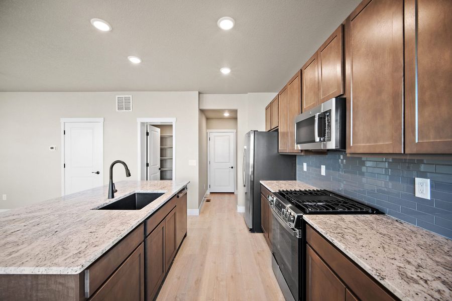 Furnished interior view inside a new home in Trails at Aspen Ridge-3, Colorado Springs (Image 10). Furnished interior view inside a new home in Trails at Aspen Ridge-3, Colorado Springs (Image 10).