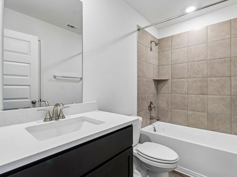 Furnished interior view inside a new home in Colony at Cole Springs - Boulevard Collection, Buda (Image 9).