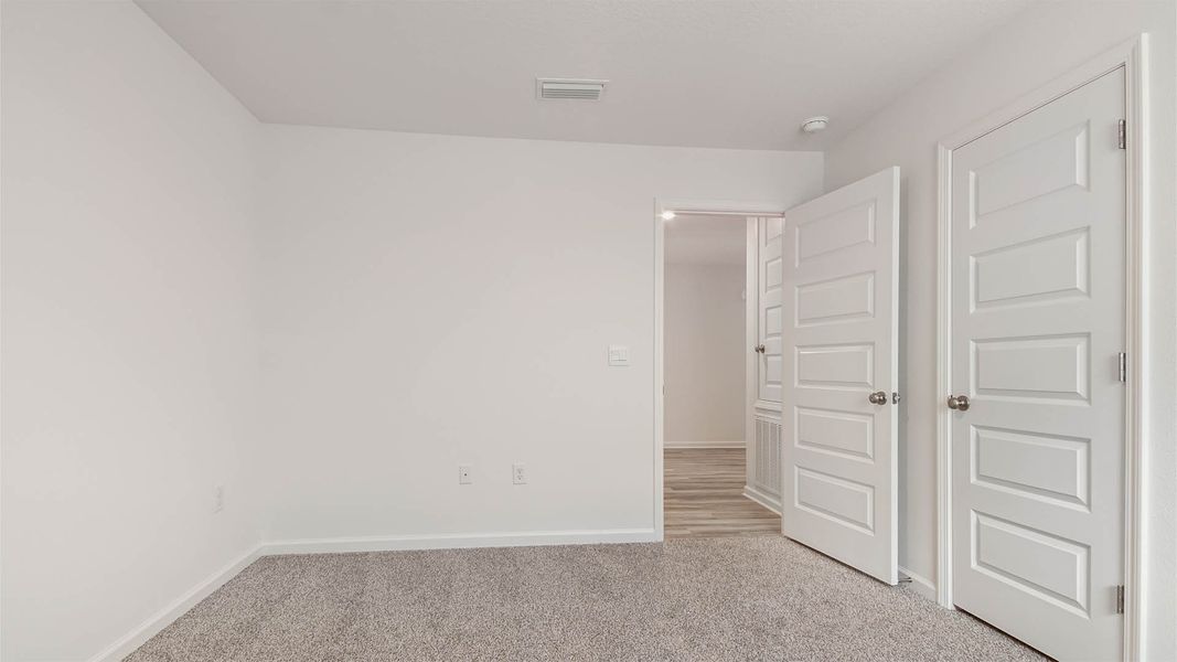 Spacious, unfurnished interior of a new home in Ashton Park Phase III, Freeport (Image 11).