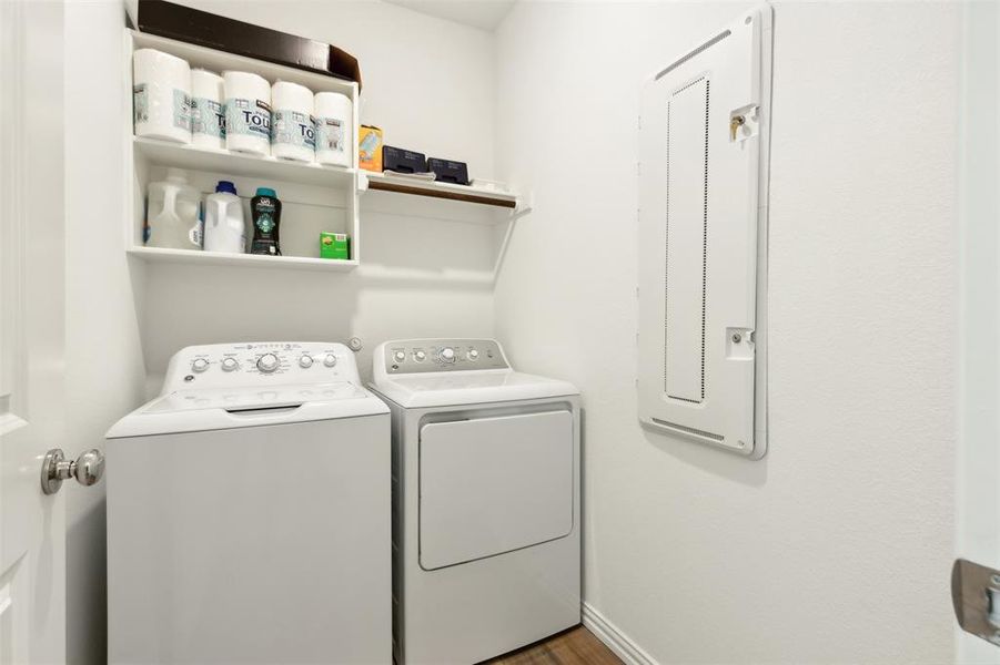 Laundry room featuring washing machine and dryer