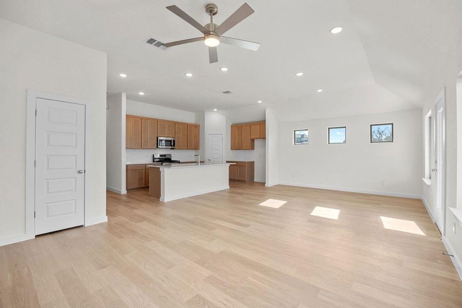 Kitchen in the Sabine home plan by Trophy Signature Homes – REPRESENTATIVE PHOTO