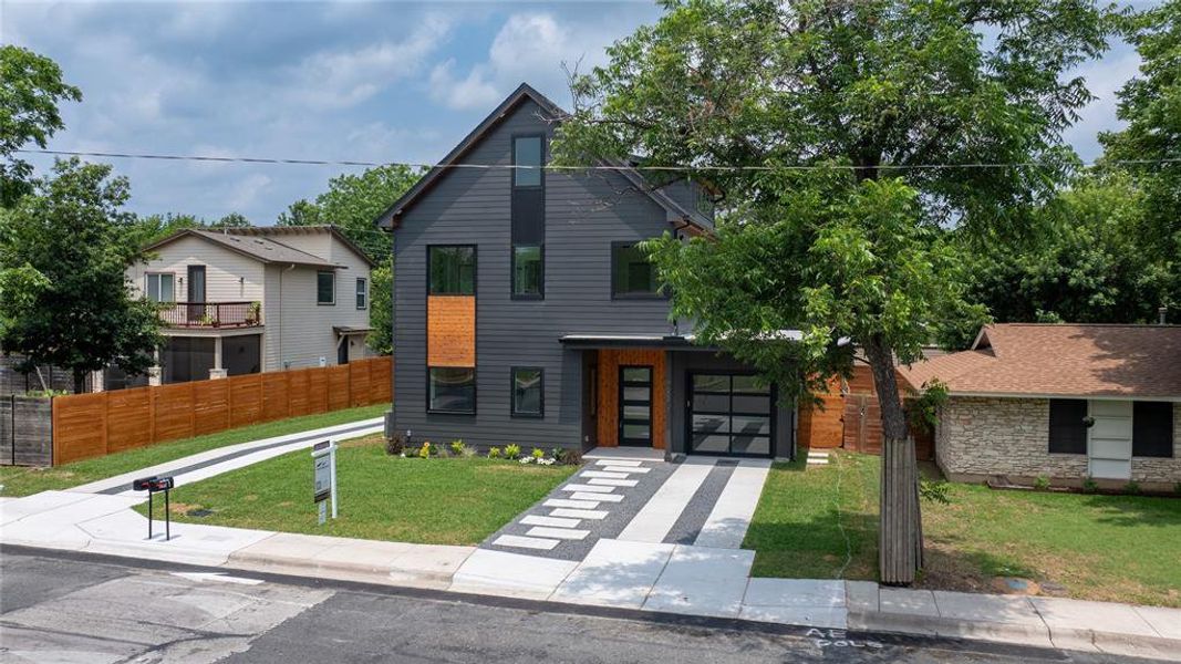 Front exterior of a new home in , Austin, TX, highlighting curb appeal (Image 27).
